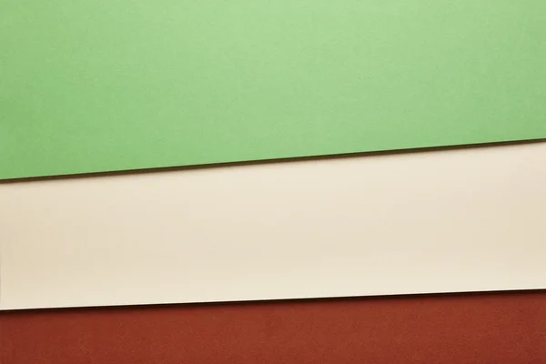 Kartony kolorowe tło zielony beżowy czerwony dźwięk. Skopiować spac — Zdjęcie stockowe