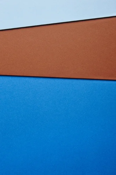 彩色的硬纸板背景在蓝色的棕色调。复制空间 — 图库照片