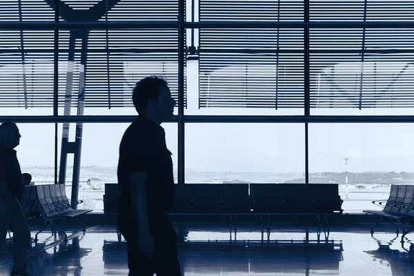 Airport indoor with people. Travel background. Business men — Stock Photo, Image