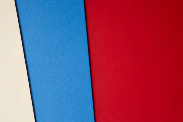 Цветной картонный фон в бежево-синем красном тоне. Копирование пространства — стоковое фото