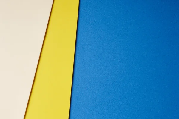 Kartony kolorowe tło beżowy, żółty, niebieskim odcieniu. Skopiuj sp — Zdjęcie stockowe