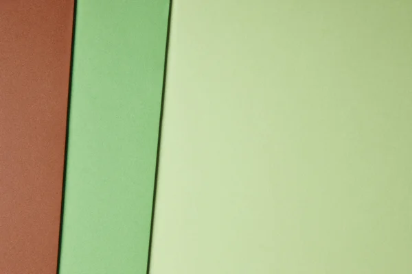 彩色的硬纸板背景在绿色的棕色调。复制空间 — 图库照片