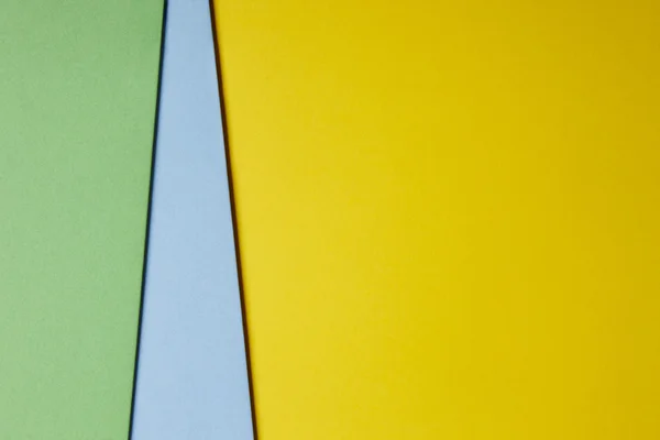 Цветные картонные фона желтый синий зеленый тон. Копирование пространства — стоковое фото