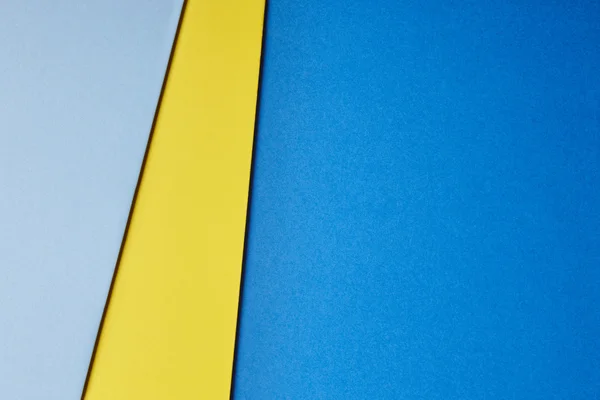 彩色的硬纸板背景蓝色黄色基调。复制空间 — 图库照片