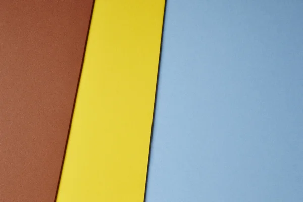 Renkli kartonlar arka plan mavi sarı kahverengi tonu. Kopya alanı — Stok fotoğraf