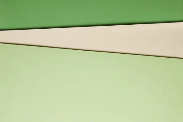 Cartolinas coloridas fundo bege tom verde. Espaço de cópia — Fotografia de Stock
