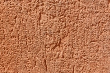 Sıcak tonda desenli taş arka plan. Yatay kopyalama uzayı