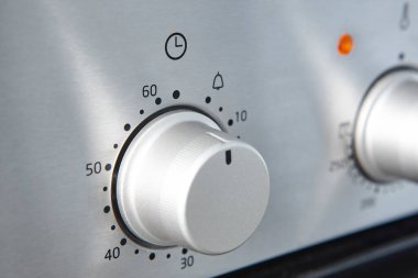 Fırın ısı kontrol düğmesi. Mutfak ekipman paneli ayrıntıları. Fırın