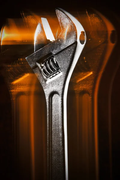 Wrench with reflection and black background — Stock Photo, Image