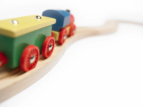 Detalhe de trem de brinquedo de madeira colorido isolado no branco — Fotografia de Stock