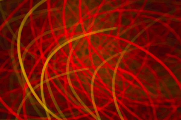 Red background with light curved lines — Stock Photo, Image