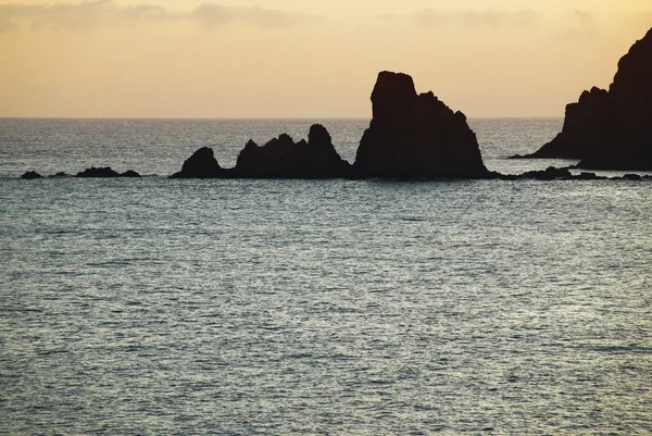 Rocky island in the mediterranean coastline at sunset, Almeria. — Stock Photo, Image