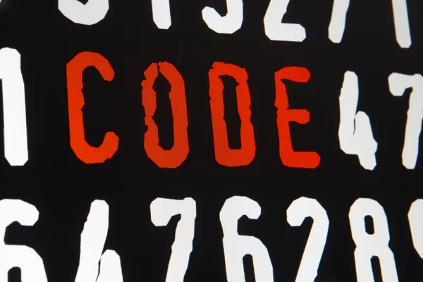 Tela do computador com texto de código no fundo preto — Fotografia de Stock