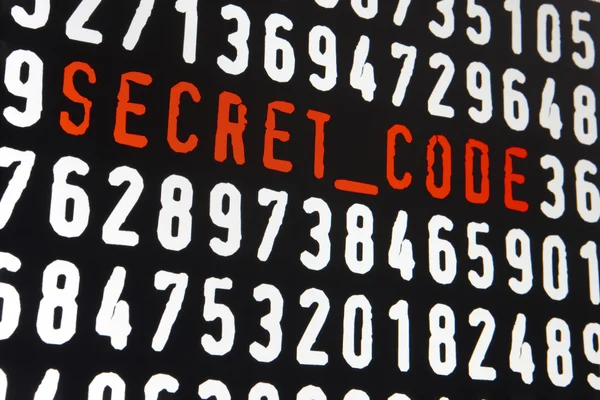 Computer screen with secret code text on black background — Stock Photo, Image