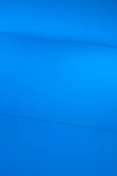 Fond en plastique bleu avec lignes rétro éclairé — Photo