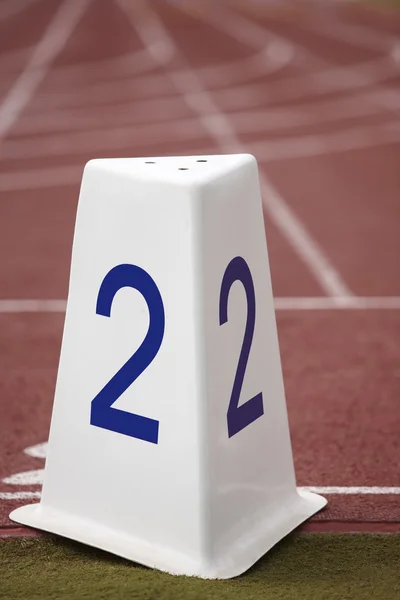 Number two signpost in an athletic running track — Stock Photo, Image