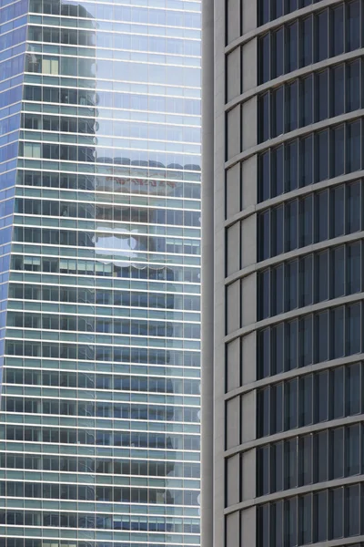 Modern metallic and glass building facades in financial area — Stockfoto