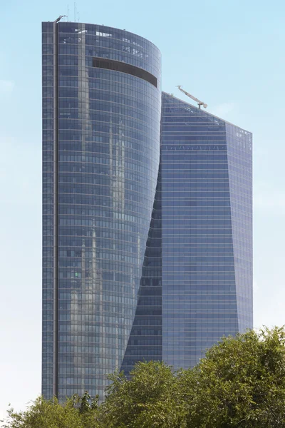 Modern building metallic and glass facades with trees — Φωτογραφία Αρχείου