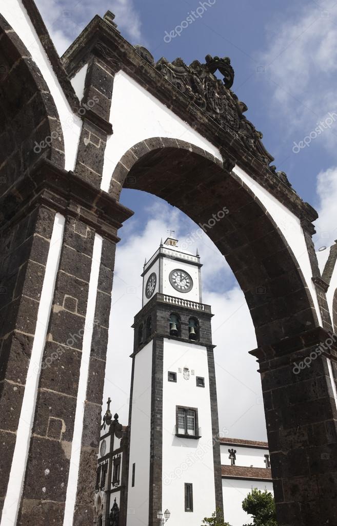 Stone arch and church. Ponta Delgada. Sao Miguel. Azores. Portug