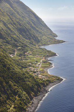 Azores coastline landscape with village in Sao Jorge island. Por clipart