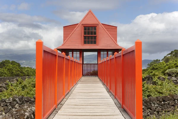 Red wooden viewpoint pathway in Pico island vineyard. Azores. Po — Stock Photo, Image