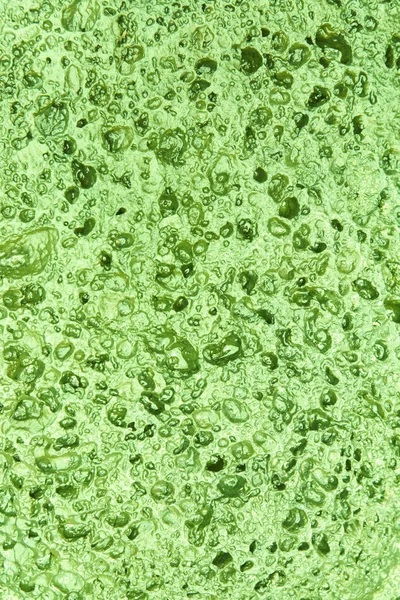 石を抽象化し、水の緑の背景 — ストック写真