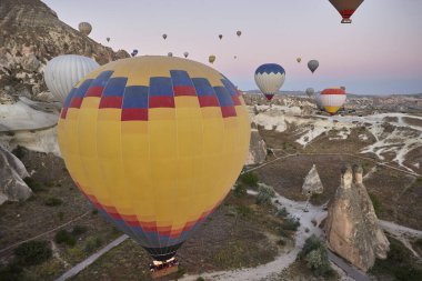 Balloons in rose valley, Cappadocia. Spectacular flight in Goreme. Turkey