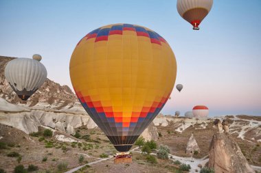 Balloons in rose valley, Cappadocia. Spectacular flight in Goreme. Turkey