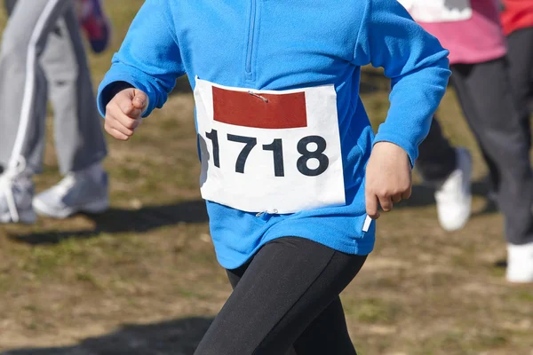 Young athletic runners on a race. Outdoor circuit — Stock Photo, Image