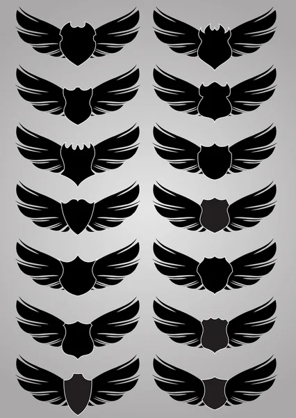 Vleugels met schilden — Stockvector