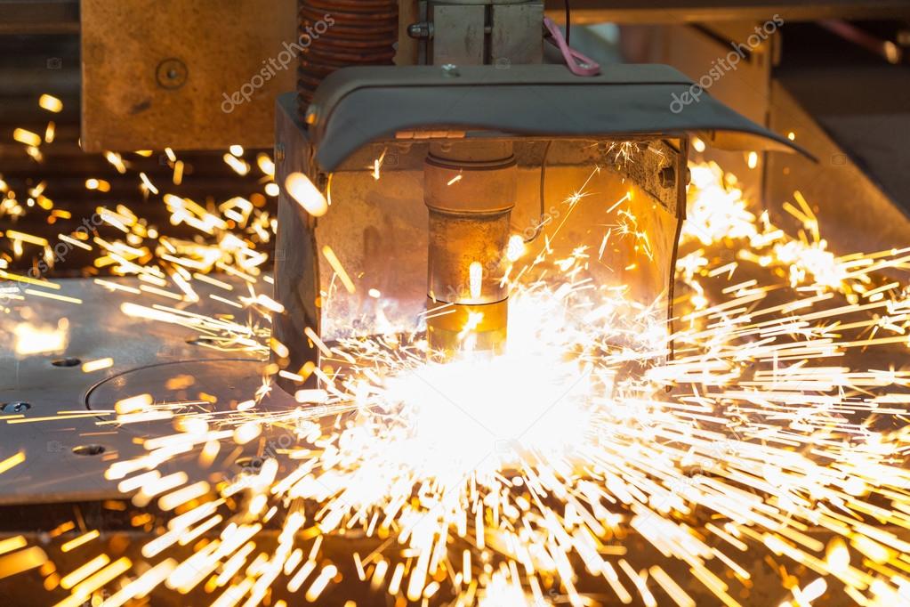 Laser cutting machine cuts steel metal sheet