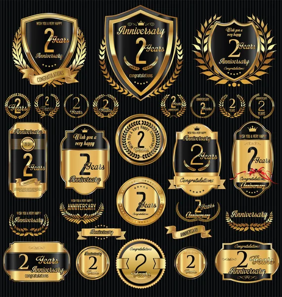 Aniversario de oro escudos coronas de laurel y colecciones de insignias — Vector de stock