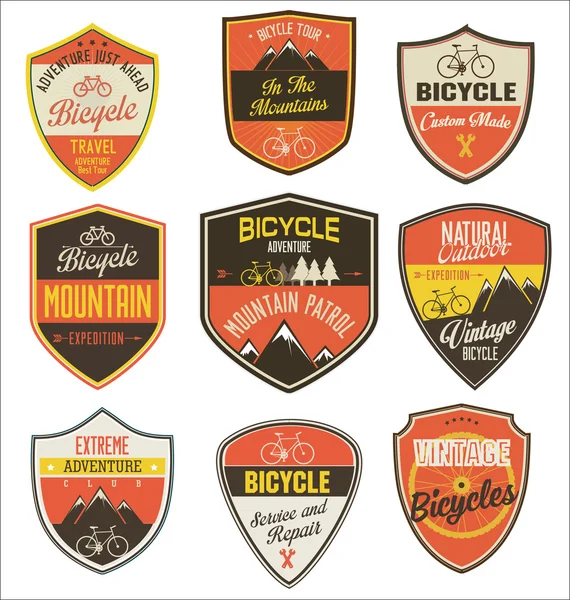 Set of bicycle retro vintage badges and labels — Stock Vector