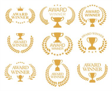 Ödül sahibi altın renkli defne çelengi koleksiyonunu simgeledi.