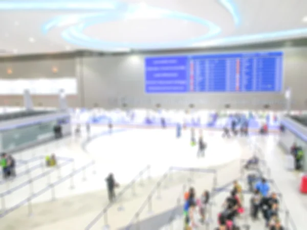 Yolcular check-in sırasında Havaalanı blur görüntü. — Stok fotoğraf