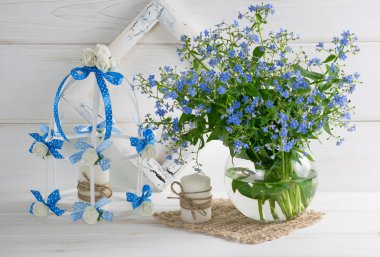 Unutma çiçekler kuş kafesi ve fotoğraf çerçevesi ve mum 