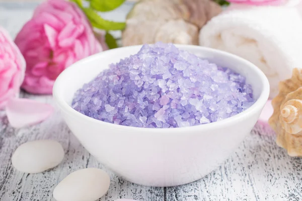 Spa salon with sea salt, towel and roses — Stock Photo, Image