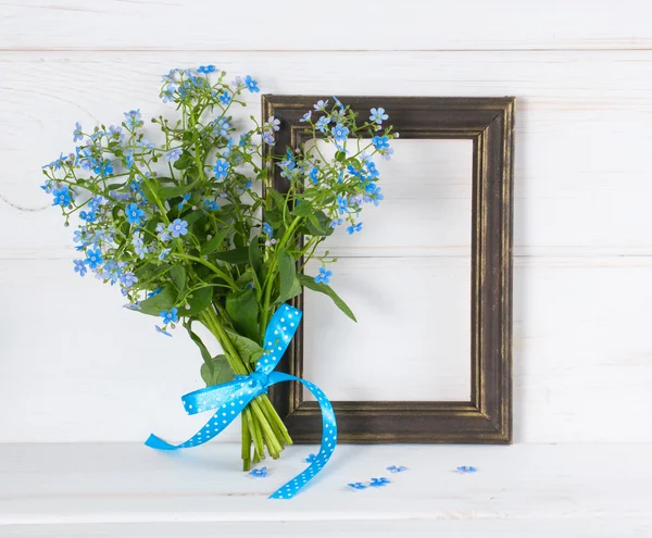 Me-nots bloemen en fotolijstjes — Stockfoto