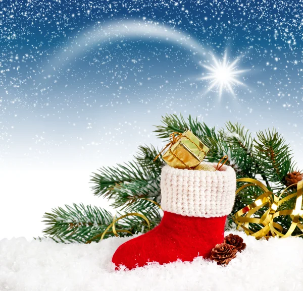 Kartki świąteczne z Santa's boot i gwiazda na niebie — Zdjęcie stockowe