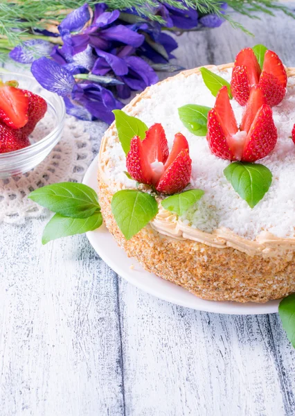 Celebratory cake with strawberries flowers and irises — Stok fotoğraf