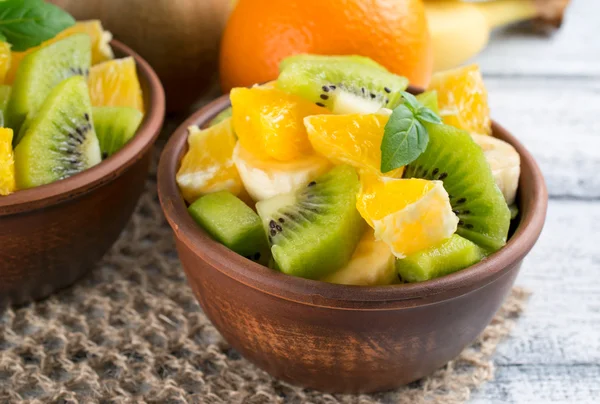 Fruit salad with kiwi, banana and orange