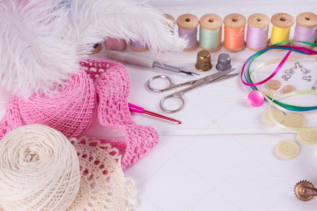 Set for sewing, knitting and needlework on a wooden board  