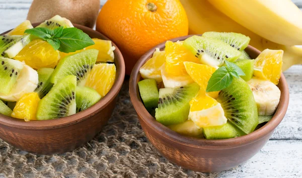 Fruit salad with kiwi, banana and orange — Stock Photo, Image