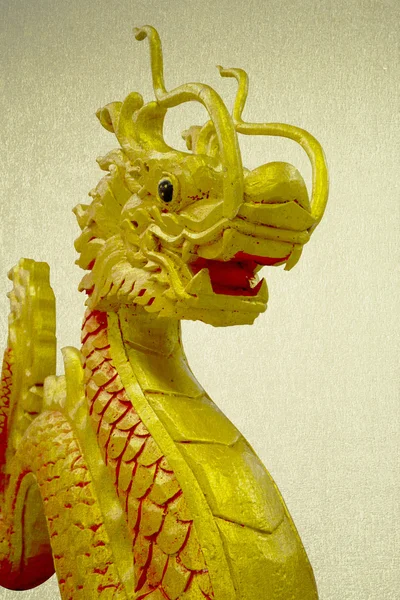 Golden Chinese dragon on vintage background — Stock Photo, Image