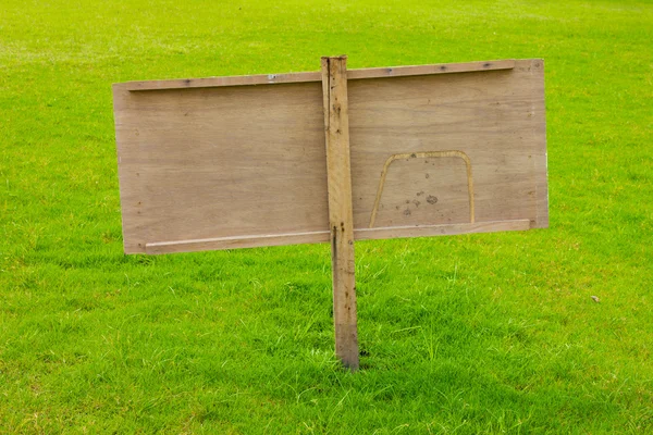 Sign in green grass — Stock Photo, Image