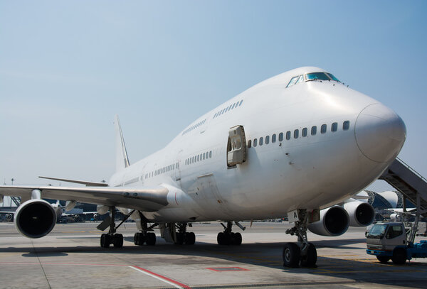 Airplane near the terminal in an airport