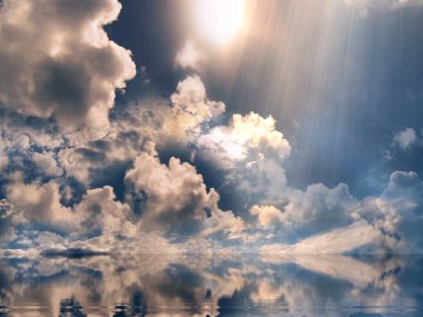 dramatical cloudy sunbeam  colorful sunset on blue  sky yellow clouds skyline, water sea reflection beautiful landscape summer nature