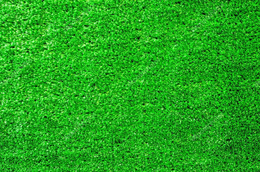 Artificial grass wall. Artificial turf. Thin green plastic — Stock Photo © sumintra 119057030
