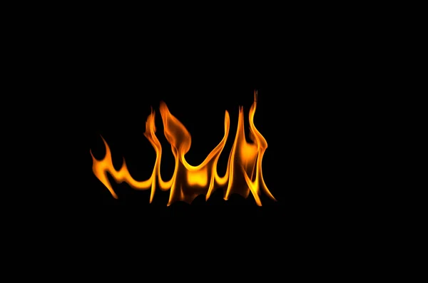 Fire flames on a black background — Stock Photo, Image