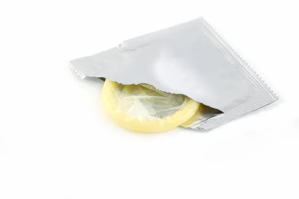 Condoom geïsoleerd op witte achtergrond Rechtenvrije Stockfoto's